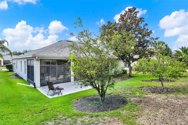 25105 Laurel Valley Rd, Leesburg, FL 34748 - view of grassy yard with a sunroom and a patio area