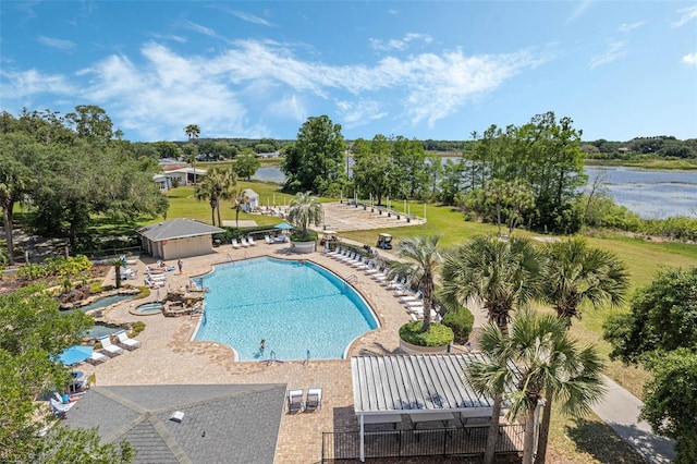 25105 Laurel Valley Rd, Leesburg, FL 34748 - community pool with view of wooded area, a water view, and a patio