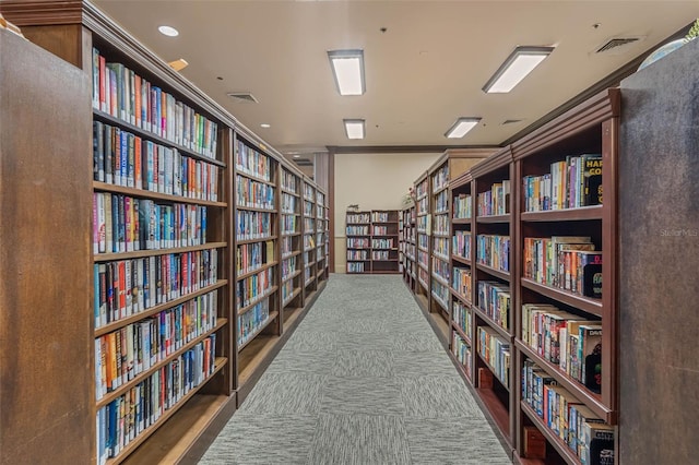 25105 Laurel Valley Rd, Leesburg, FL 34748 - misc room featuring wall of books