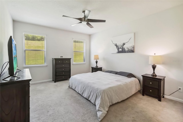 3142 Hill Point St, Minneola, FL 34715 - bedroom featuring light colored carpet, multiple windows, and a ceiling fan