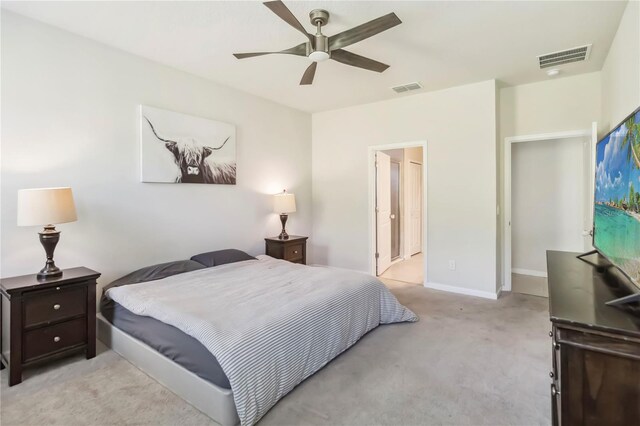 3142 Hill Point St, Minneola, FL 34715 - bedroom featuring light colored carpet and a ceiling fan