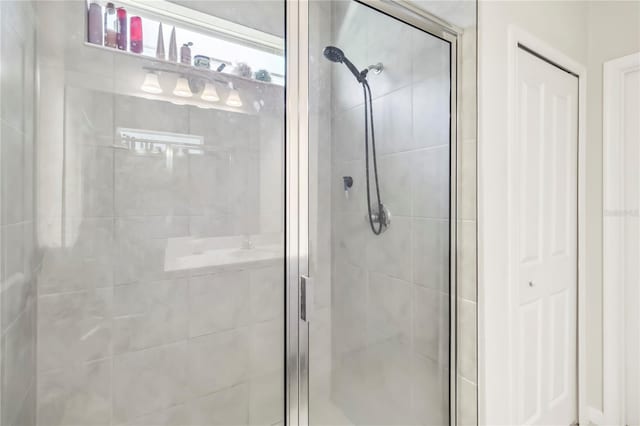 3142 Hill Point St, Minneola, FL 34715 - bathroom featuring a stall shower