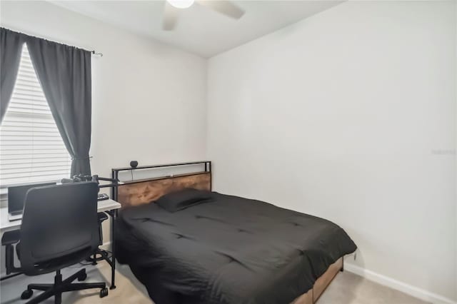 3142 Hill Point St, Minneola, FL 34715 - carpeted bedroom with ceiling fan and a desk