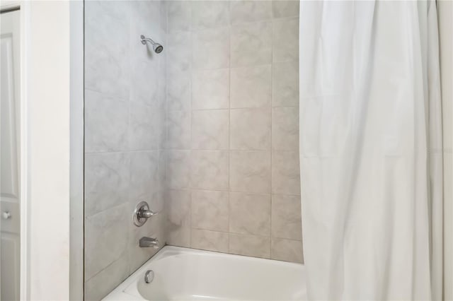 3142 Hill Point St, Minneola, FL 34715 - bathroom with shower / bath combination with curtain