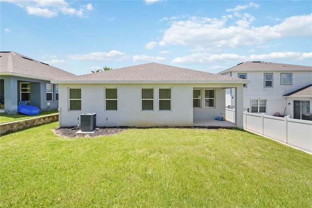 3142 Hill Point St, Minneola, FL 34715 - back of property with stucco siding, roof with shingles, and a patio