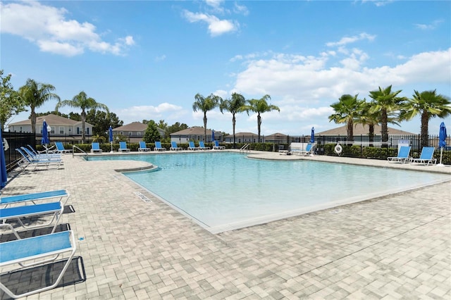 3142 Hill Point St, Minneola, FL 34715 - community pool with a patio