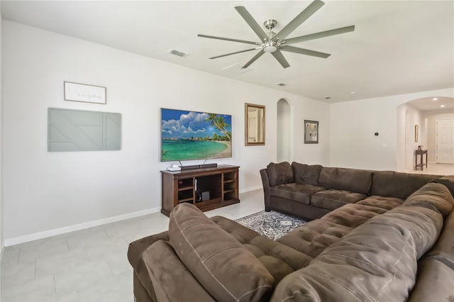 3142 Hill Point St, Minneola, FL 34715 - living room featuring arched walkways and a ceiling fan