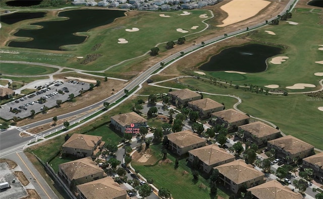 1269 Long Cove Loop Unit 1269, Davenport, FL 33896 - aerial view of property and surrounding area featuring a nearby body of water, a golf course, and nearby suburban area