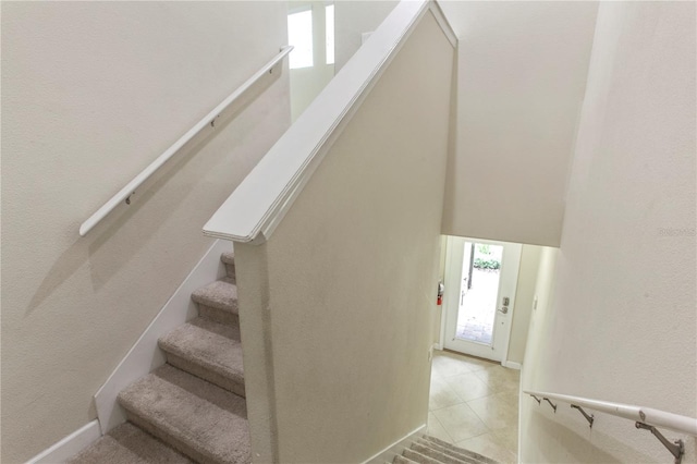 1269 Long Cove Loop Unit 1269, Davenport, FL 33896 - stairs with healthy amount of natural light and tile patterned flooring