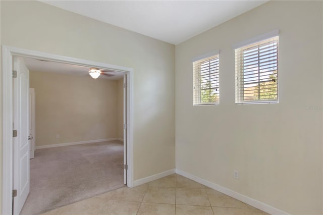1269 Long Cove Loop Unit 1269, Davenport, FL 33896 - empty room with light carpet and light tile patterned floors