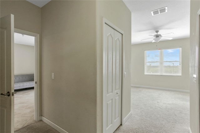 1269 Long Cove Loop Unit 1269, Davenport, FL 33896 - corridor with baseboards and light colored carpet