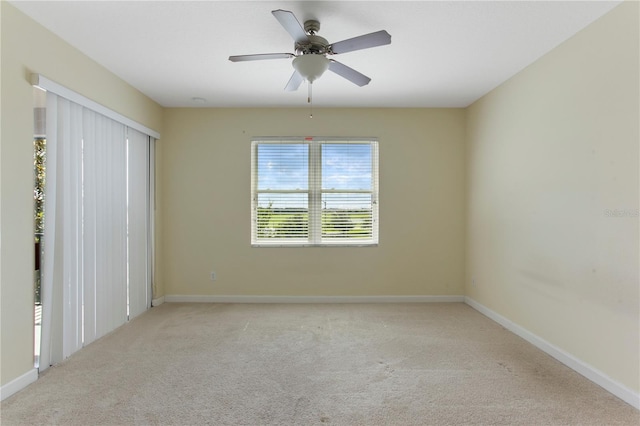1269 Long Cove Loop Unit 1269, Davenport, FL 33896 - carpeted spare room featuring baseboards and ceiling fan