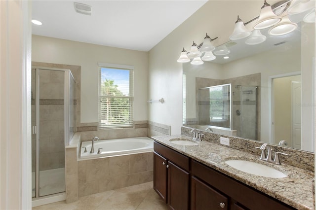 1269 Long Cove Loop Unit 1269, Davenport, FL 33896 - full bath featuring tile patterned flooring, a bath, double vanity, and a shower stall