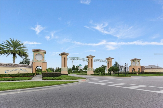 1269 Long Cove Loop Unit 1269, Davenport, FL 33896 - view of asphalt road featuring street lights, curbs, and sidewalks