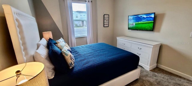 1201 Challenge Dr, Davenport, FL 33896 - bedroom featuring carpet floors and baseboards