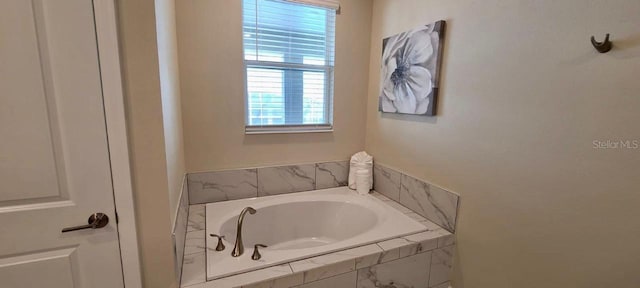 1201 Challenge Dr, Davenport, FL 33896 - bathroom with a bath