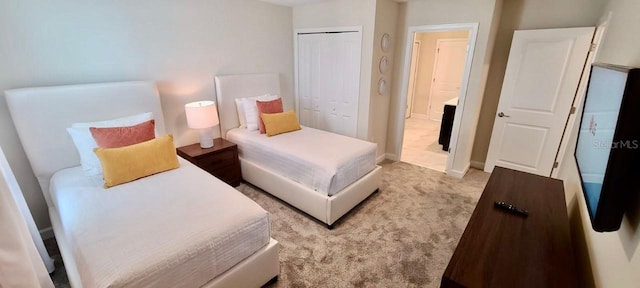 1201 Challenge Dr, Davenport, FL 33896 - bedroom with light colored carpet and a closet