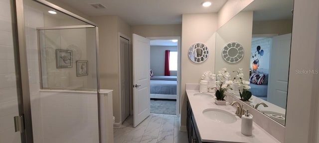 1201 Challenge Dr, Davenport, FL 33896 - ensuite bathroom featuring marble look tile flooring, double vanity, a shower stall, and recessed lighting