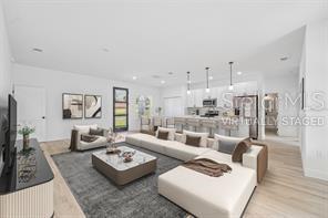4572 SW 149th St, Ocala, FL 34473 - living area with light wood-type flooring