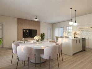 4572 SW 149th St, Ocala, FL 34473 - dining area featuring ceiling fan and light wood finished floors