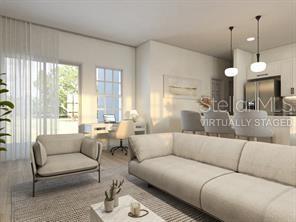 4572 SW 149th St, Ocala, FL 34473 - living room featuring wood finished floors