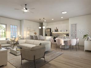 4572 SW 149th St, Ocala, FL 34473 - living area featuring a ceiling fan, wood finished floors, and recessed lighting