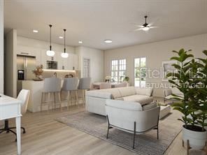 4572 SW 149th St, Ocala, FL 34473 - living room featuring light wood-style floors, recessed lighting, and ceiling fan