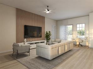 4572 SW 149th St, Ocala, FL 34473 - living area featuring light wood finished floors and ceiling fan