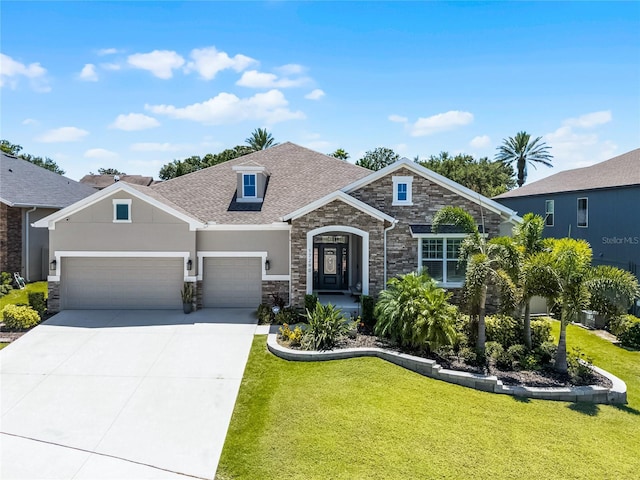 17290 Hickory Wind Dr, Clermont, FL 34711 - view of front facade with stone siding, a front yard, a garage, driveway, and roof with shingles