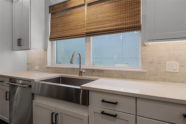 17290 Hickory Wind Dr, Clermont, FL 34711 - kitchen featuring light countertops, stainless steel dishwasher, and tasteful backsplash