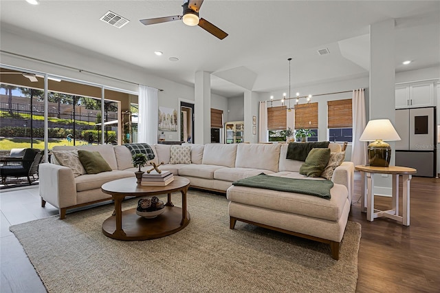 17290 Hickory Wind Dr, Clermont, FL 34711 - living room with a ceiling fan, recessed lighting, dark wood-type flooring, and a chandelier