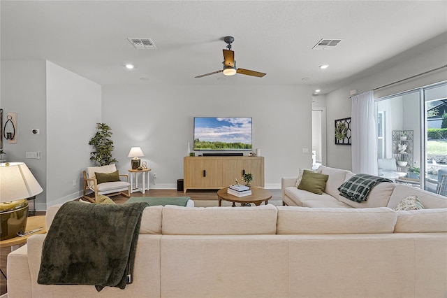 17290 Hickory Wind Dr, Clermont, FL 34711 - living area featuring a ceiling fan, recessed lighting, and wood finished floors