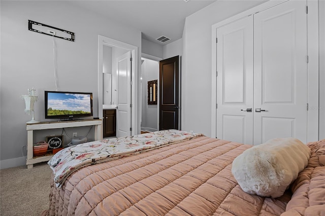 17290 Hickory Wind Dr, Clermont, FL 34711 - bedroom with carpet floors, a closet, and connected bathroom