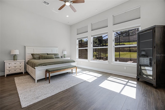 17290 Hickory Wind Dr, Clermont, FL 34711 - bedroom with dark wood-type flooring, a ceiling fan, and recessed lighting