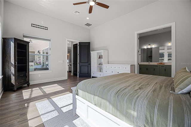 17290 Hickory Wind Dr, Clermont, FL 34711 - bedroom with wood finished floors, connected bathroom, and a ceiling fan