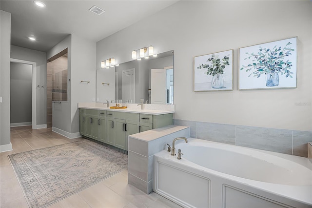 17290 Hickory Wind Dr, Clermont, FL 34711 - full bath featuring double vanity, a bath, and recessed lighting