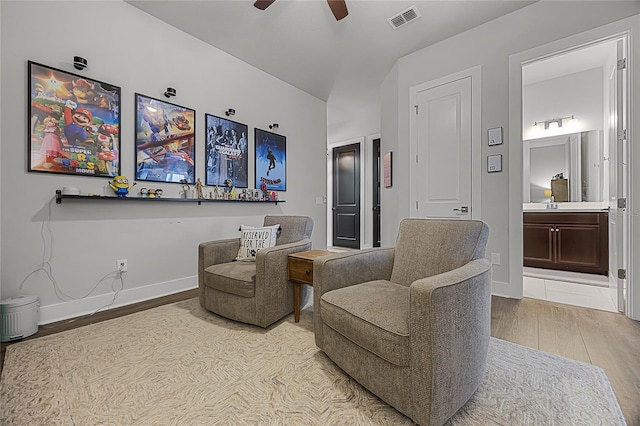 17290 Hickory Wind Dr, Clermont, FL 34711 - living area with wood finished floors and a ceiling fan