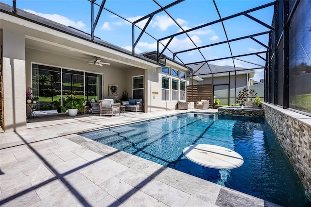 17290 Hickory Wind Dr, Clermont, FL 34711 - view of pool featuring a patio area, ceiling fan, an outdoor living space, a pool with connected hot tub, and glass enclosure
