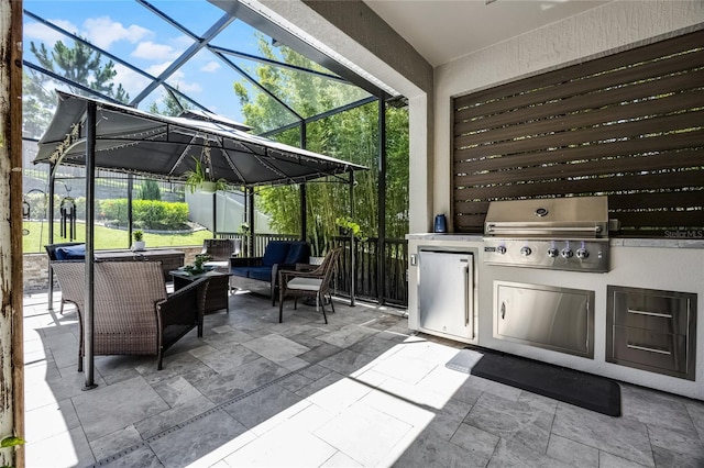 17290 Hickory Wind Dr, Clermont, FL 34711 - view of patio / terrace with an outdoor kitchen, a lanai, and an outdoor hangout area