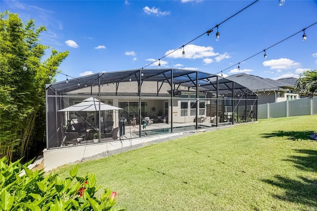 17290 Hickory Wind Dr, Clermont, FL 34711 - back of house with a patio area and a lanai