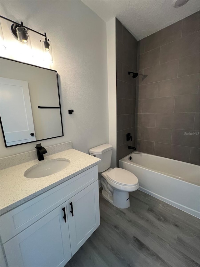 569 Marion Oaks Mnr, Ocala, FL 34473 - bathroom with wood finished floors, vanity, and shower / bath combination