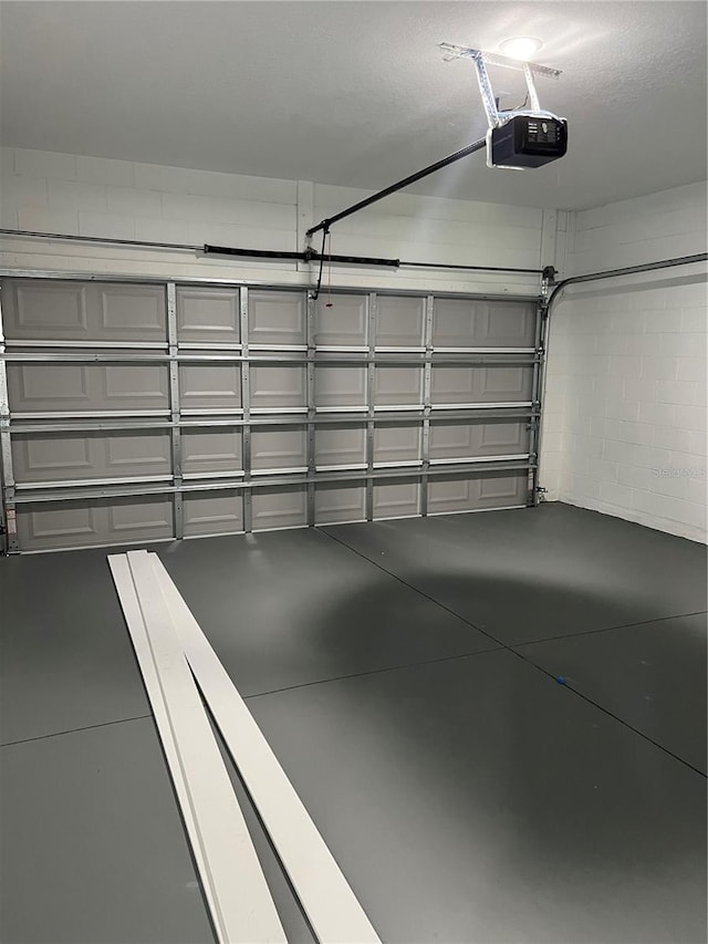 569 Marion Oaks Mnr, Ocala, FL 34473 - garage featuring a garage door opener