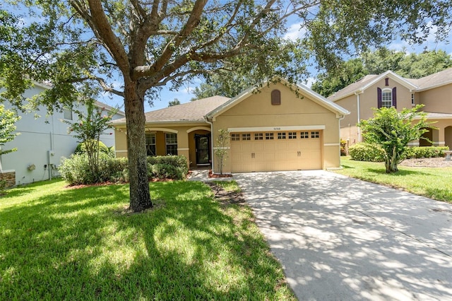 30308 Cheval St, Mount Dora, FL 32757 - ranch-style house with stucco siding, a front yard, an attached garage, and concrete driveway