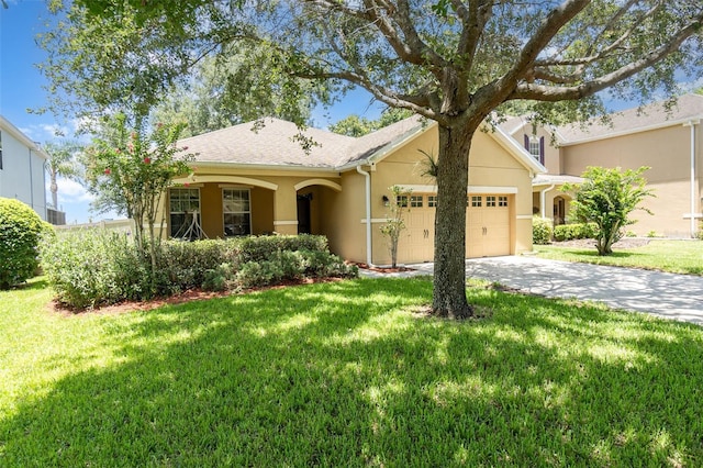 30308 Cheval St, Mount Dora, FL 32757 - view of front of property featuring an attached garage, stucco siding, driveway, and a front yard