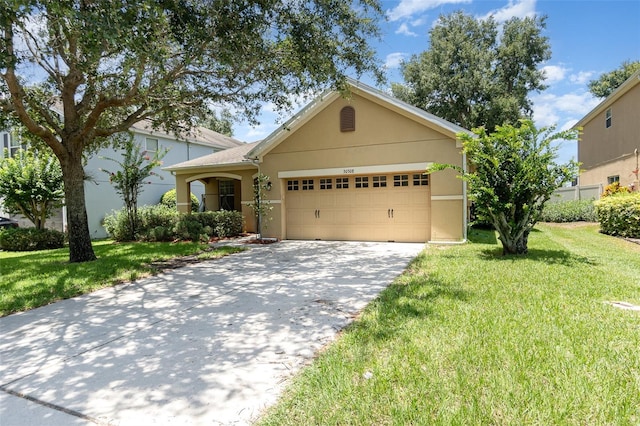 30308 Cheval St, Mount Dora, FL 32757 - view of front of property with a garage, a front lawn, concrete driveway, and stucco siding