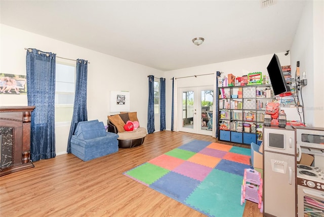 30308 Cheval St, Mount Dora, FL 32757 - game room with wood finished floors and french doors