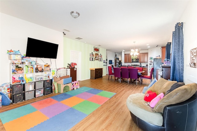 30308 Cheval St, Mount Dora, FL 32757 - game room with a chandelier and light wood-style floors