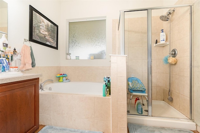 30308 Cheval St, Mount Dora, FL 32757 - full bathroom featuring vanity, a shower stall, and a bath