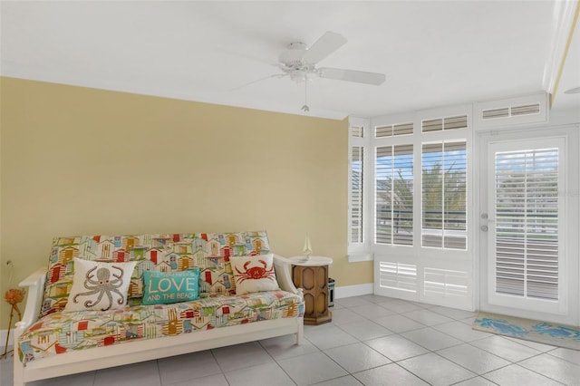 4631 S Atlantic Ave Unit 8102, Port Orange, FL 32127 - sitting room with tile patterned floors and ceiling fan