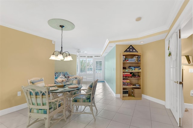 4631 S Atlantic Ave Unit 8102, Port Orange, FL 32127 - dining room featuring crown molding, light tile patterned flooring, and a chandelier